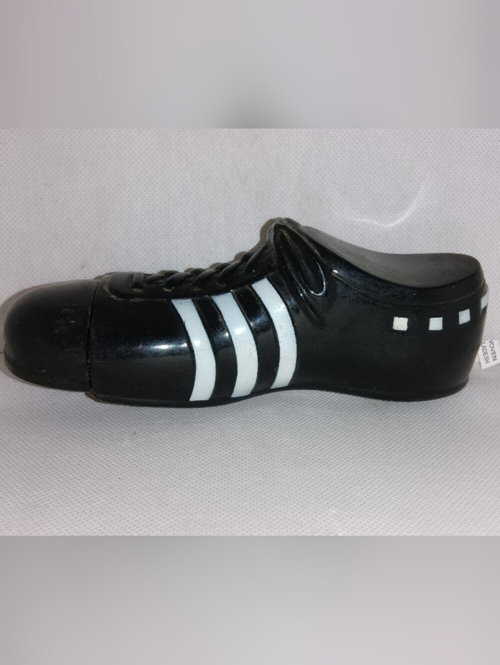 Avon Black Cleat Shoe with White Stripe Accents